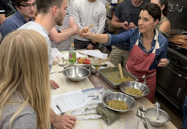 Students learn to cook Persian cuisine
